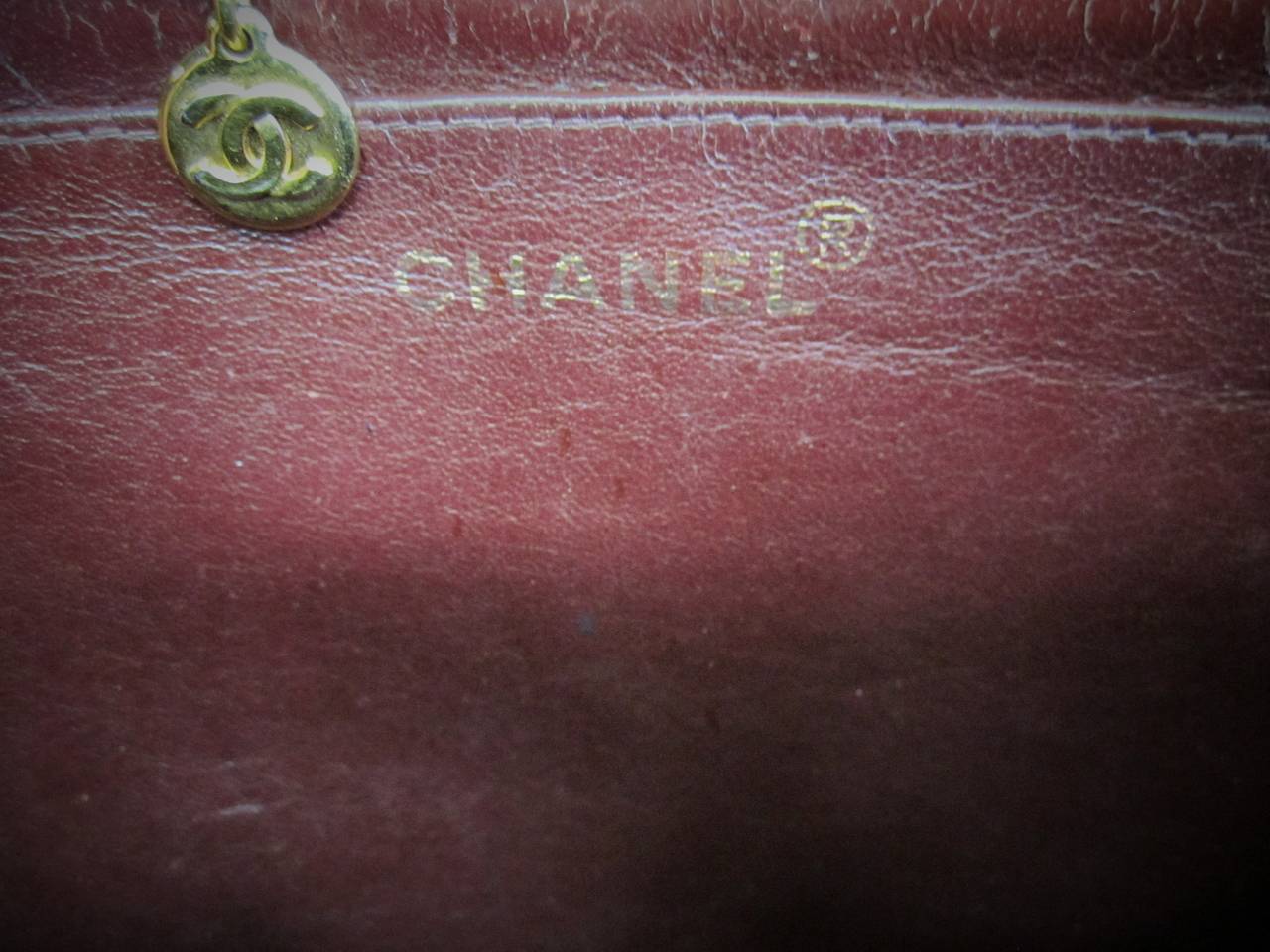 Brass Authentic Chanel Black Classic Lambskin Maxi Handbag with Gold Tone Hardware