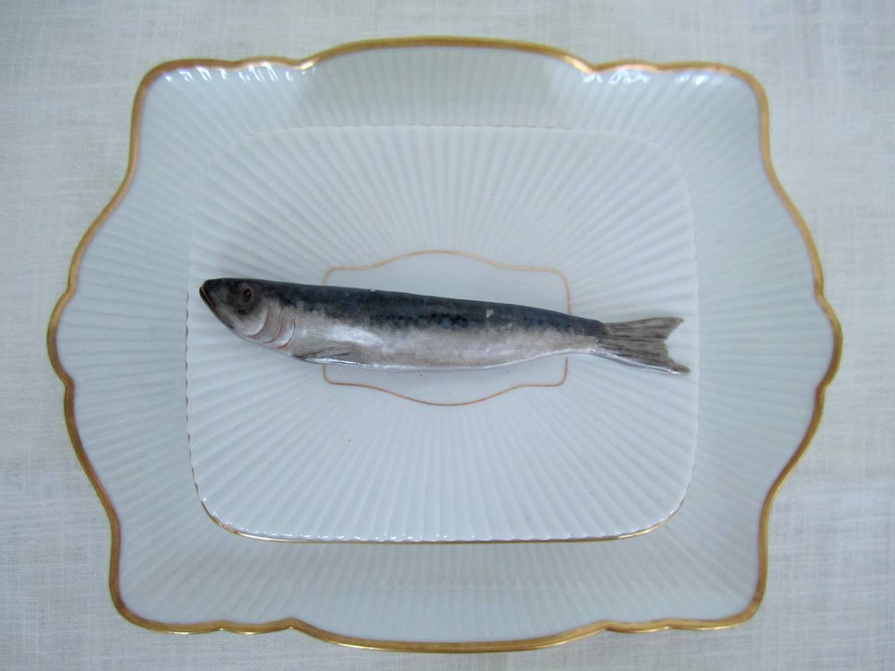 A vintage 3 part French Porcelain 'Sardine' Box Dish by Mehun, with hand painted sardine and karat gold trim. Makers mark under base plate and under 'box' as shown in images. Item available here online, and by request, can be made available at my