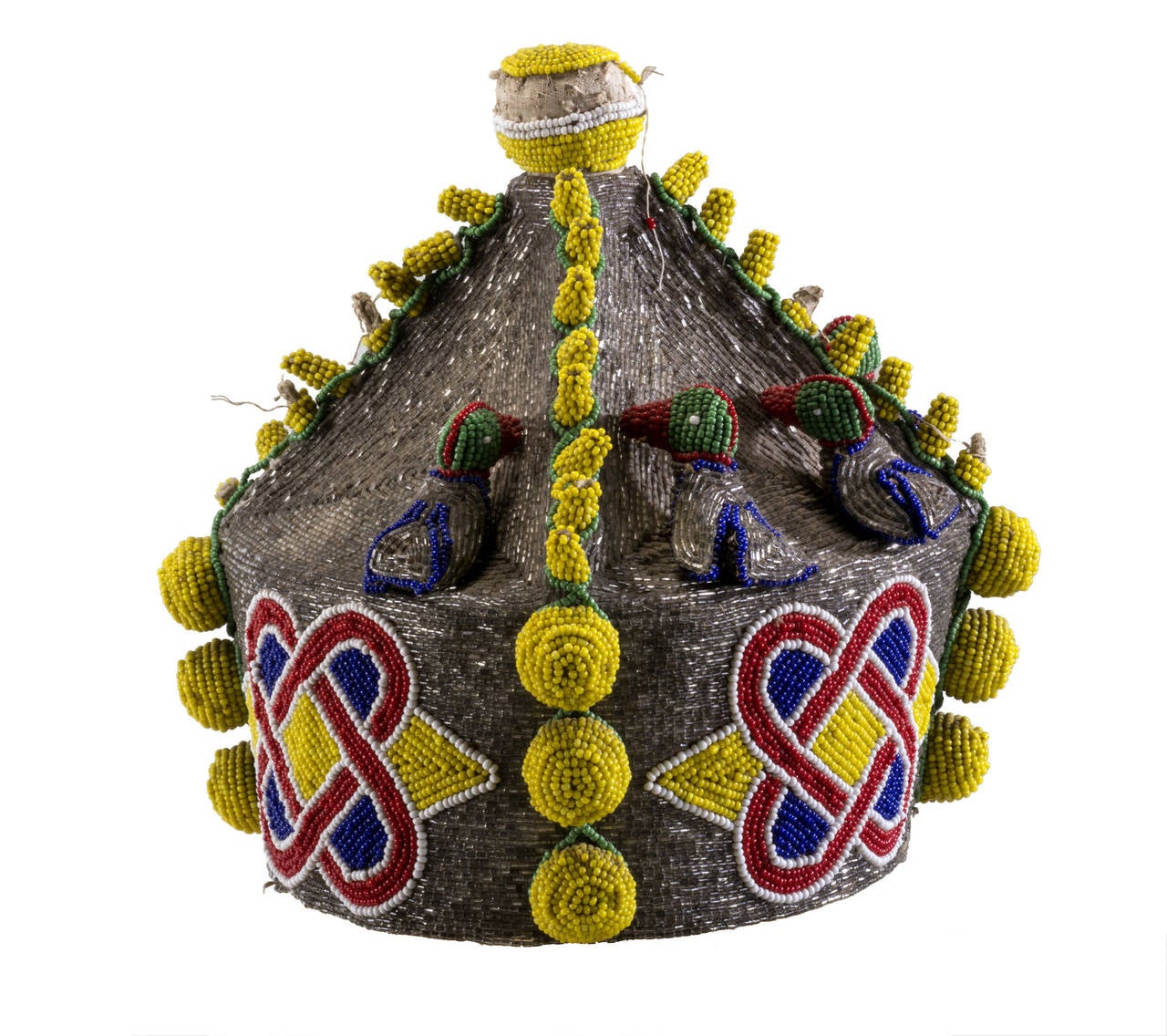 Beautiful beaded hat from Yoruba Tribe Nigeria with bright yellow, red, blue and green colors. Its nice an vibrant worn by Yoruba priest from Nigeria.
It has infinity symbol which means everlasting. It does have healing quality to it. Missing only