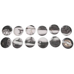 Set of Twelve Fornasetti Porcelain Plates Depicting Eve