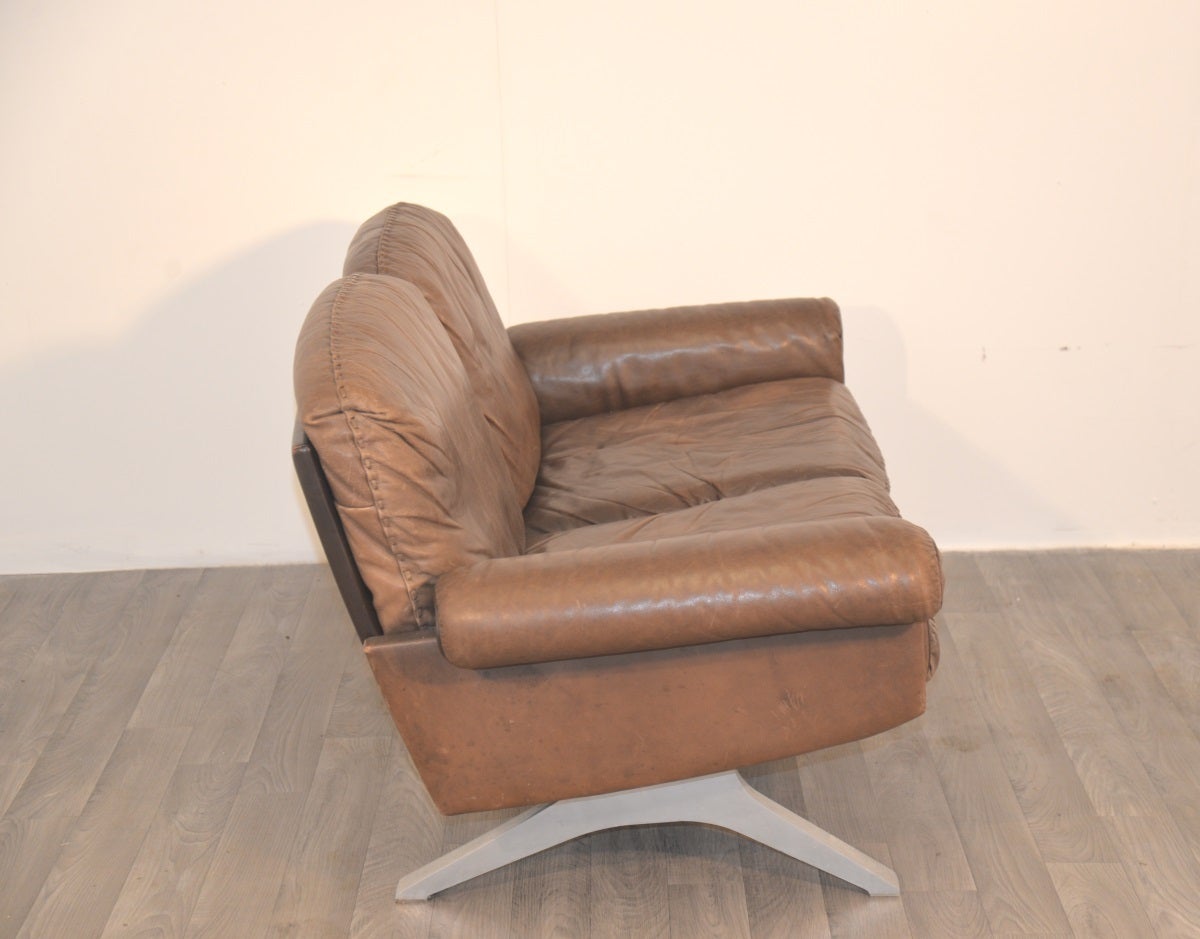 Vintage 1970s de Sede DS 31 two-seater sofa in soft chocolate brown leather. Manufactured circa 1970`s by de Sede in Switzerland . The vintage two-seater sofa sits on cast aluminium legs and is presented in excellent vintage condition. There are