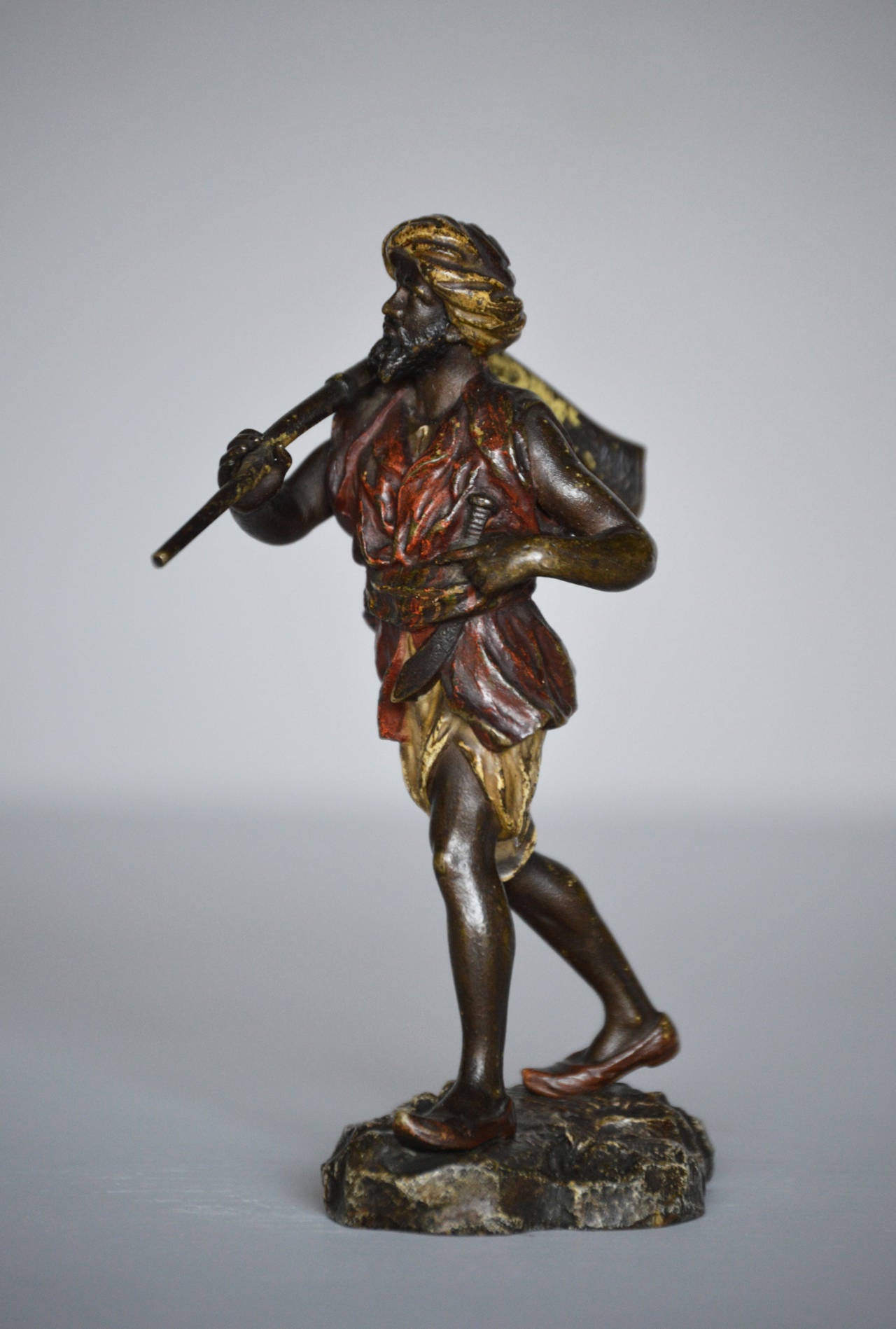 Franz Xavier Bergman
Austrian (1861-1936)
Bronze, signed & stamped
Height: 4¾ inches

An excellent quality late 19th century cold painted bronze sculpture of an Arab warrior with a rifle over his shoulder. The bronze has good hand finished