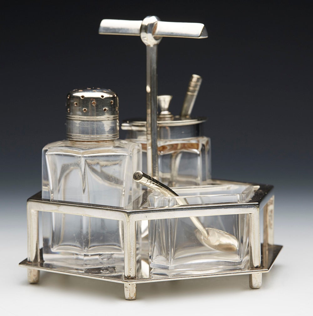 Originating from a private estate is this rare and stunning arts and crafts silver plated three part cruet set designed by Christopher Dresser for Hukin & Heath and dated 11th August 1878. This exceptionally fine made cruet comprises a hexagonal