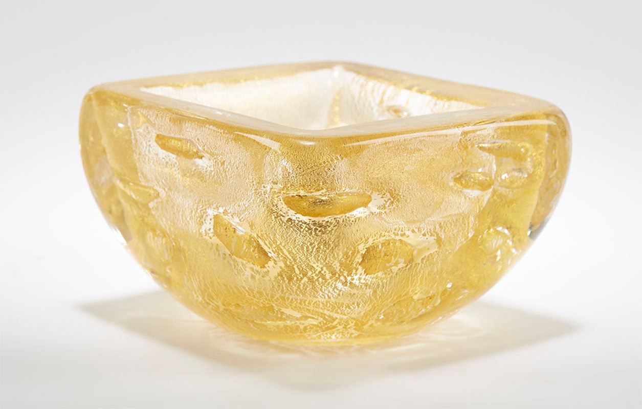 Murano handblown heavily made clear art glass bowl of square form with gold aventrine and large controlled bubble inclusions attributed to Salviati. The bowl has a flat polished base and is not signed.