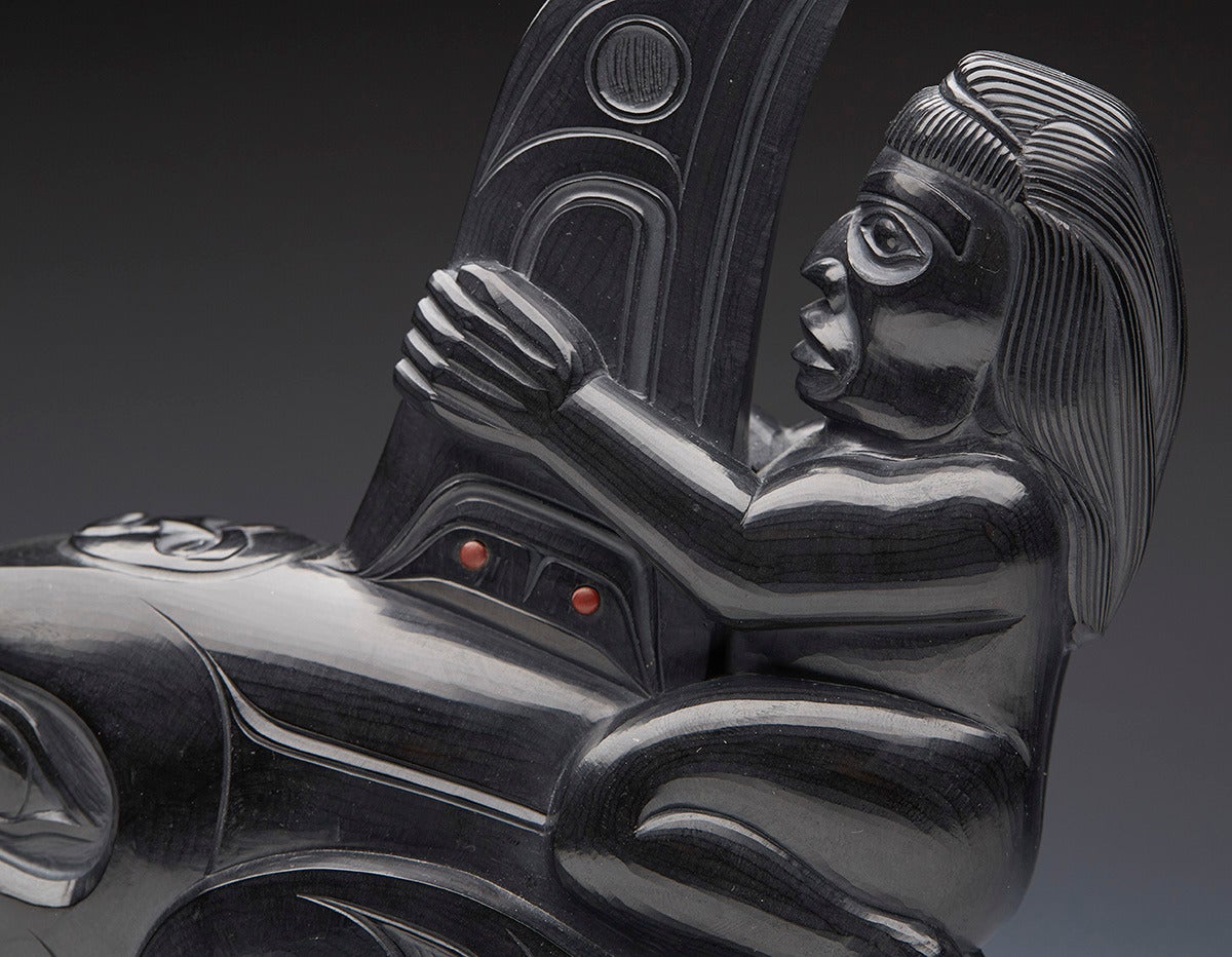 Originating from a private collection of Northwest American Native and related art is this fine unique Haida argillite carving titled 'SGAAN' Supernatural Being by renowned Haida Nation artist Christian White. This large sized sculpture is carved on