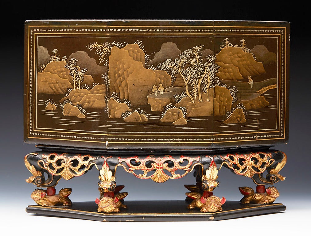 A superb antique Chinese lacquered and carved incense burner stand with cover. The six sided wooden stand is finely carved with a flat diamond shaped base with six supports each with a loose fitted and well detailed lion dog  with scroll work