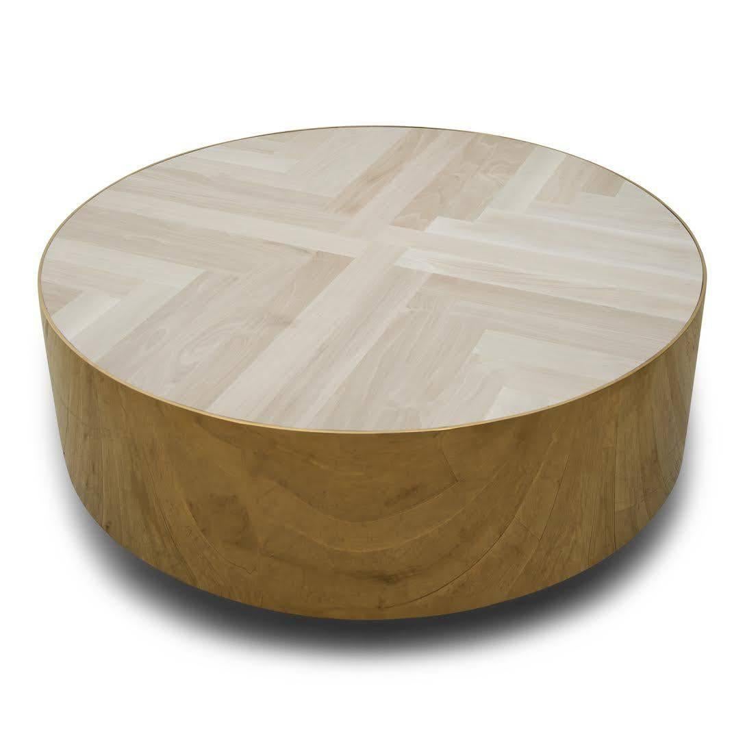 This beautifully handcrafted coffee table is sure to impress. Featuring a beautiful bleached walnut laid out in a herringbone pattern and supported by a polished brass base.

Dimensions:
48