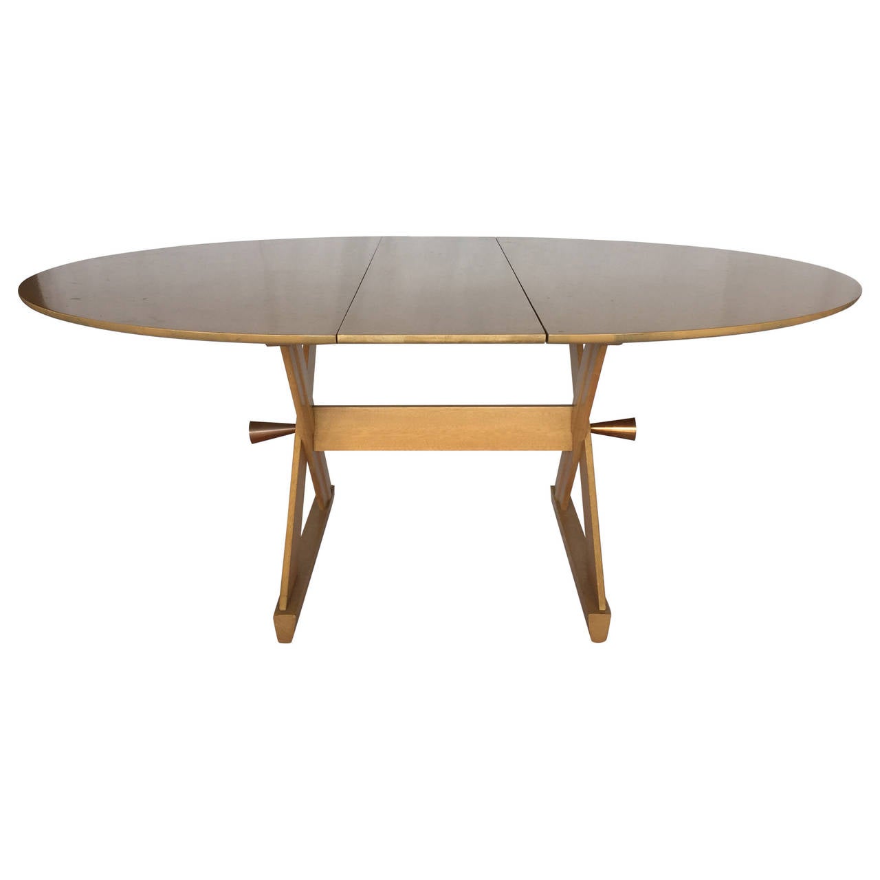 Designed by Paul Laszlo for Brown-Saltman, a Mid-Century Modern light mahogany dining or gaming table with copper accent hardware in the base. Signed and labeled by Paul Laszlo for Brown-Saltman. Extendable with included leaf.

Excellent vintage