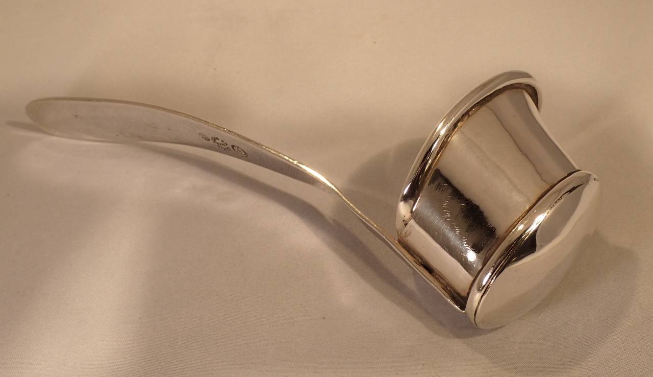A beautiful ranchero style silver soup ladle by Hector Aguilar. Formed with a tub shaped bowl mounted to a nicely curved and tapered paddle shaped handle

This Hector Aguilar sugar and creamer set can be seen featured in Penny Morrill's