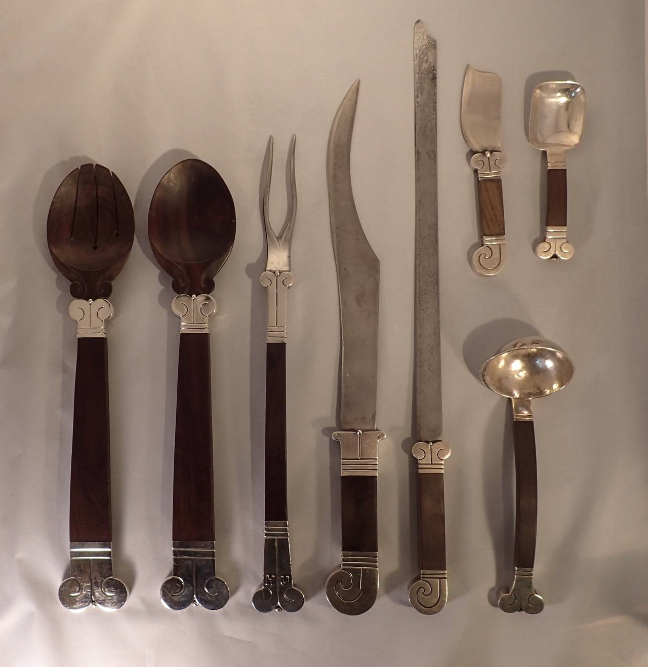 Carved 1940s Hector Aguilar Silver and Rosewood Thirty-Six-Piece Flatware Set For Sale
