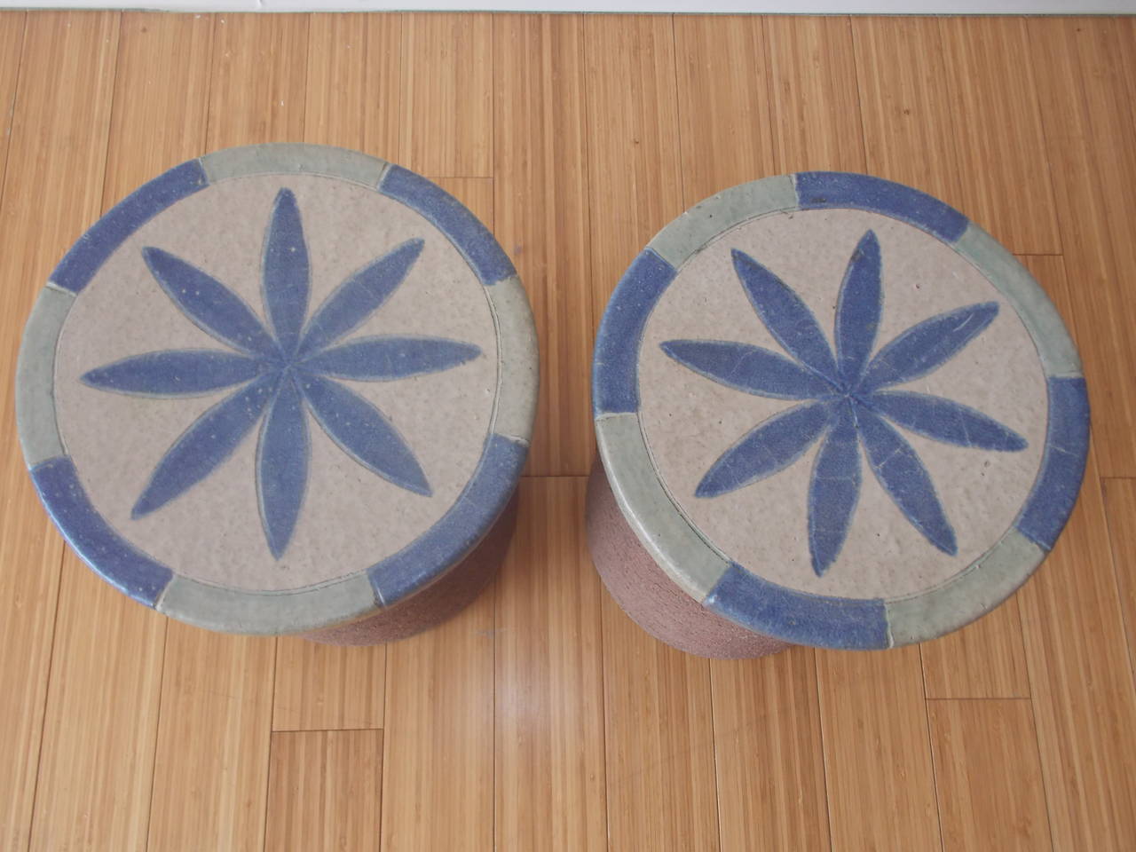 A nice pair of ceramic designs, with glazed star pattern.
These can be used as garden stools or tables.