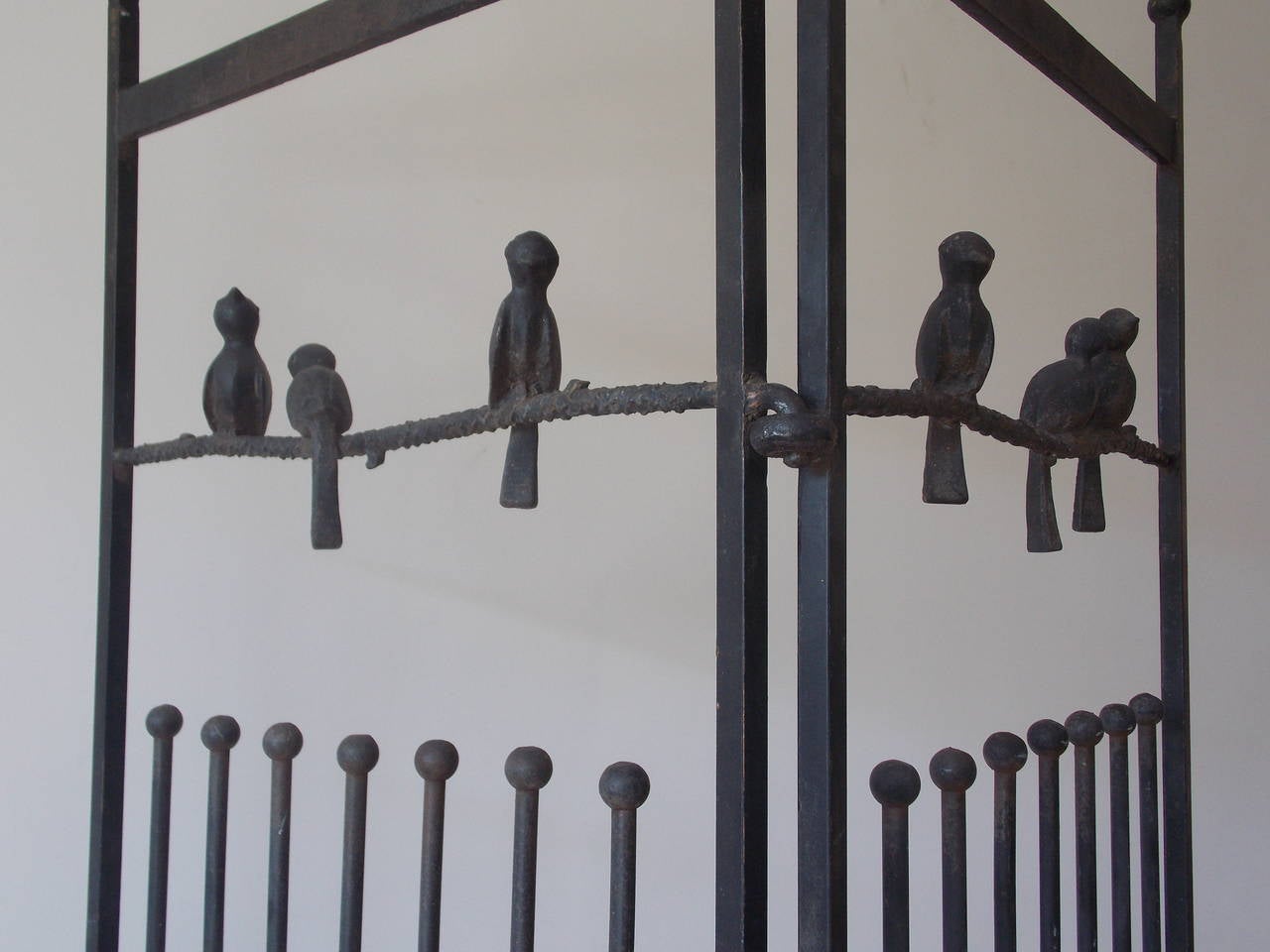 A fun sculptural and decorative design.
Great to use indoors or out.
Made of cast and welded steel.
One bird is missing its' tail.
Other than that, it's still solid and sturdy.