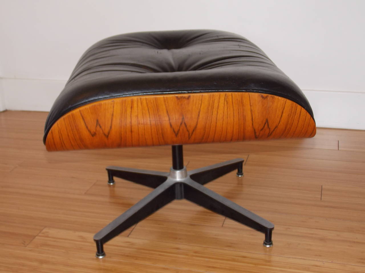 From the estate of Rod McKuen 1933-2015 - song writer and poet.
This ottoman is in the original used condition, with original screws and glides.
The leather has some faint cat scratches (which is highlighted by the camera flash- otherwise it's