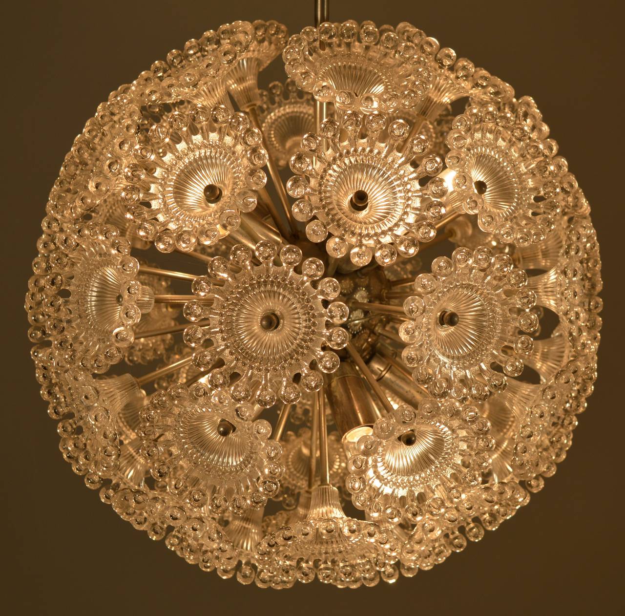 This very special chandelier was designed and manufactured in Germany during the 1970s. The frame is made of chrome-plated metal and the flowers are made from plexiglass. Excellent condition.