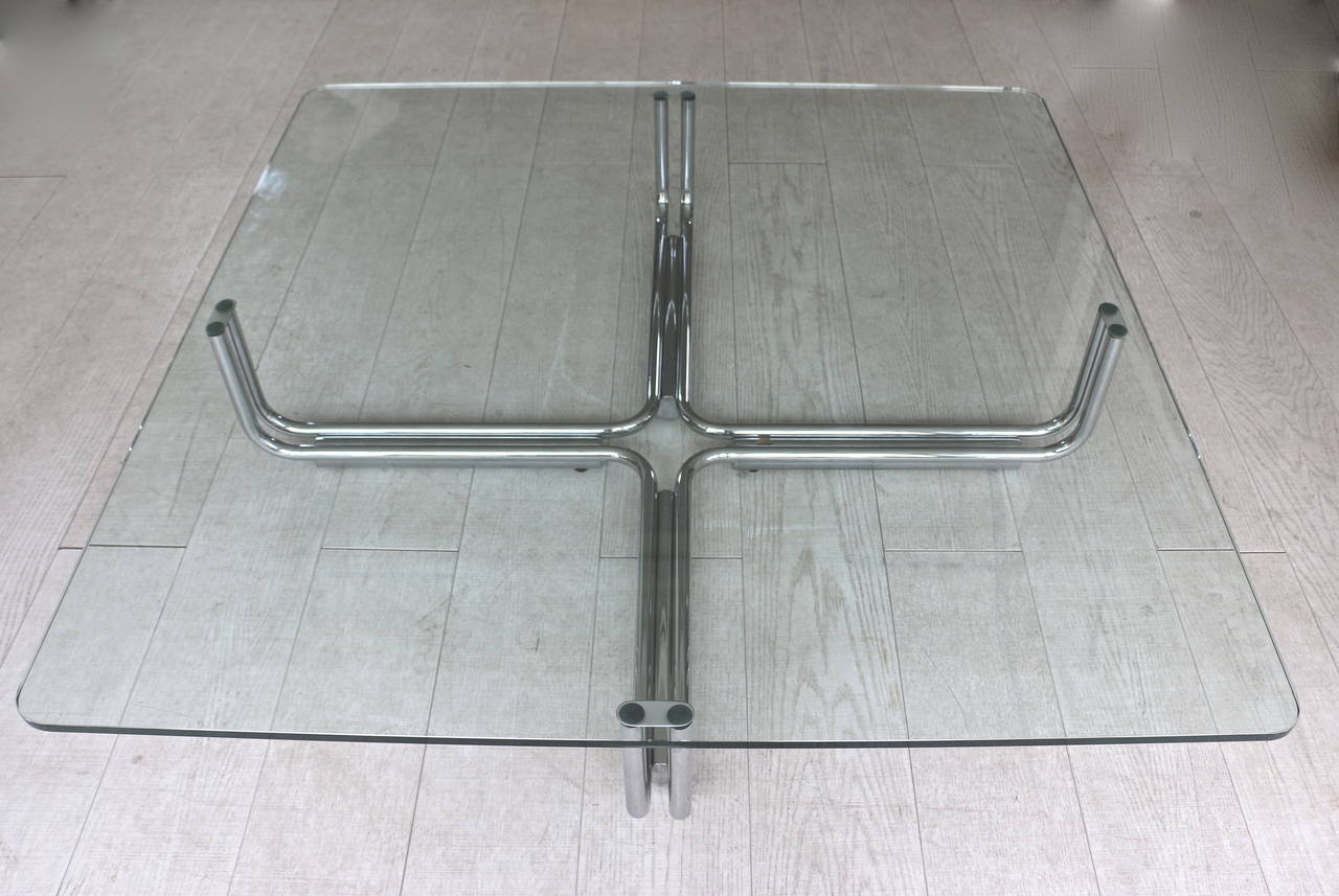 Gianfranco Frattini for Cassina coffee table composed of a thick glass top and a chromed tube base. 1969