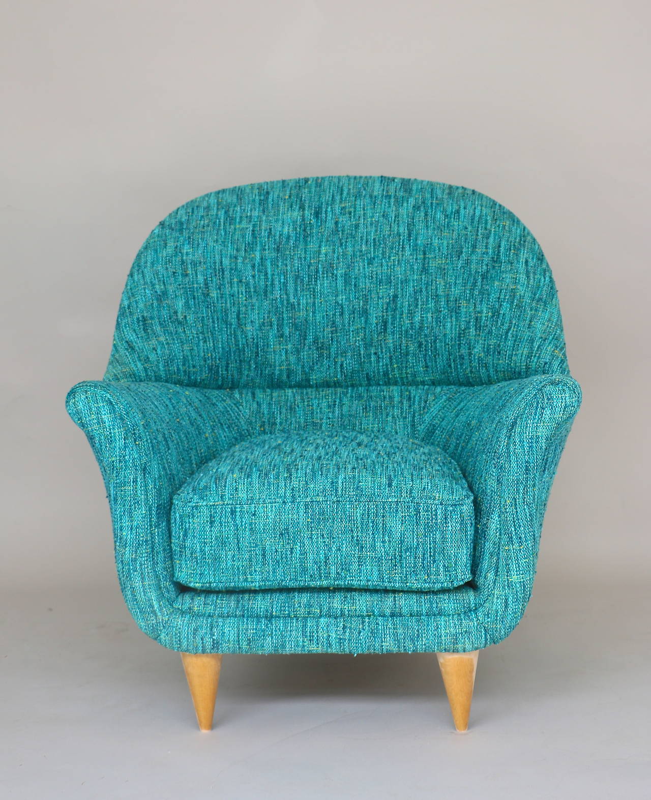 Pair of 1950s Italian Armchairs covered in blue mottled fabric. Fabric is from Maison Rubelli.