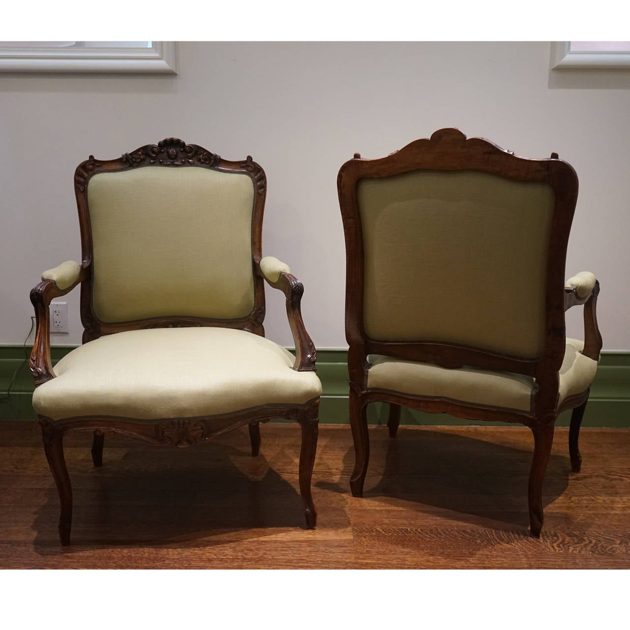 Late 18th Century Pair of Louis XV Style Carved Walnut Fauteuils