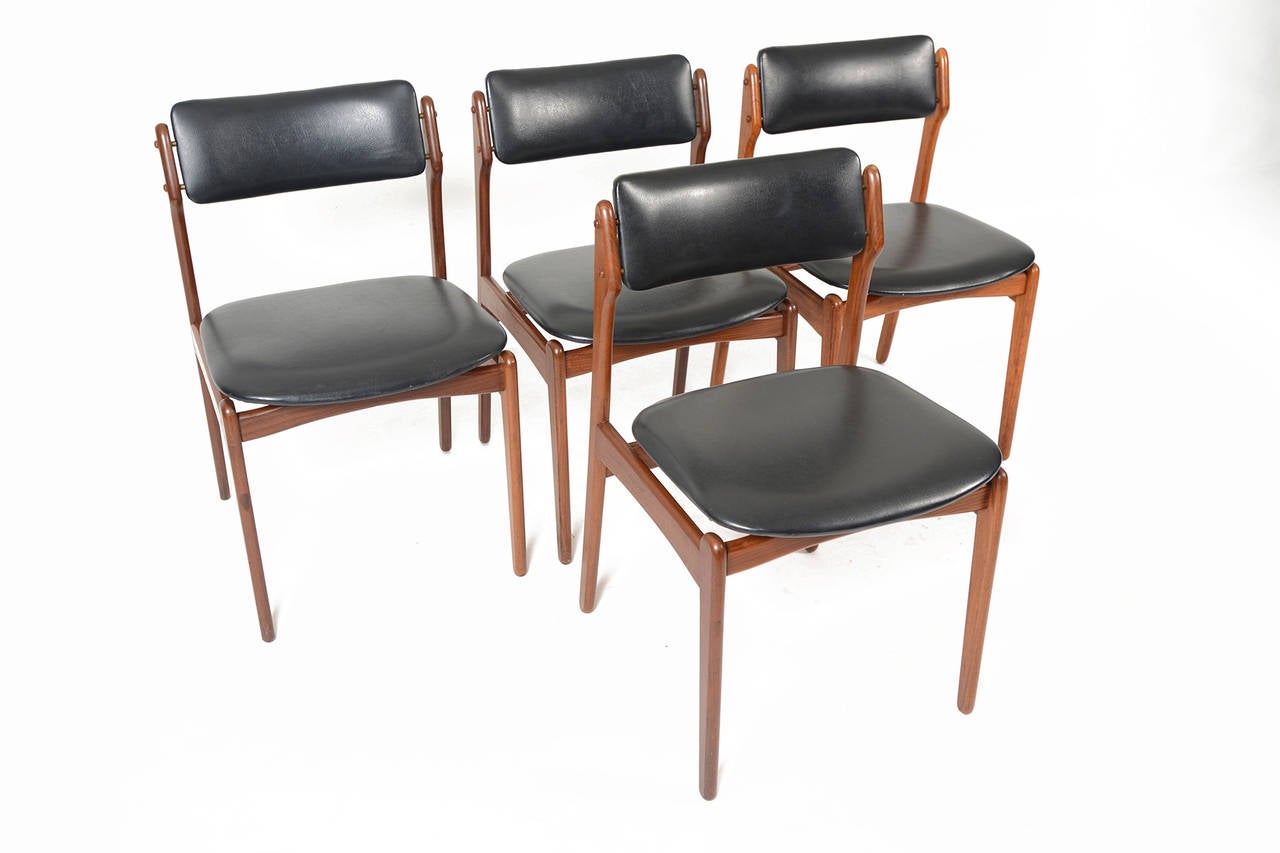 Set of Four Erik Buck Dining Chairs in Teak and Black Vinyl