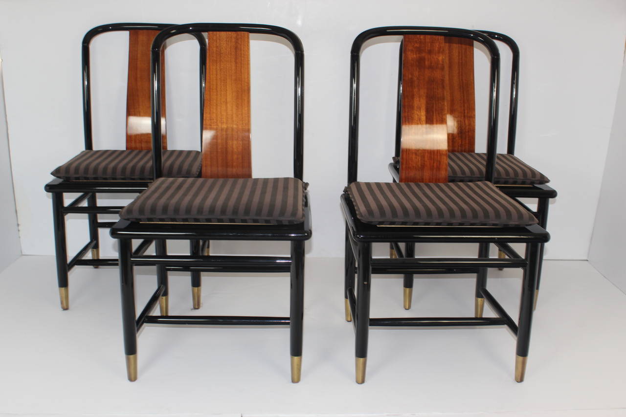 1950s Henredon chairs with cane seat, lacquer frame, bentwood backs and brass feet. Armchair dimensions 24.5