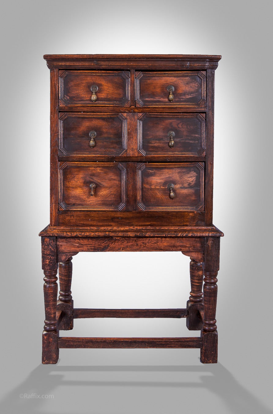 Early 19th century Jacobean style chest on stand.