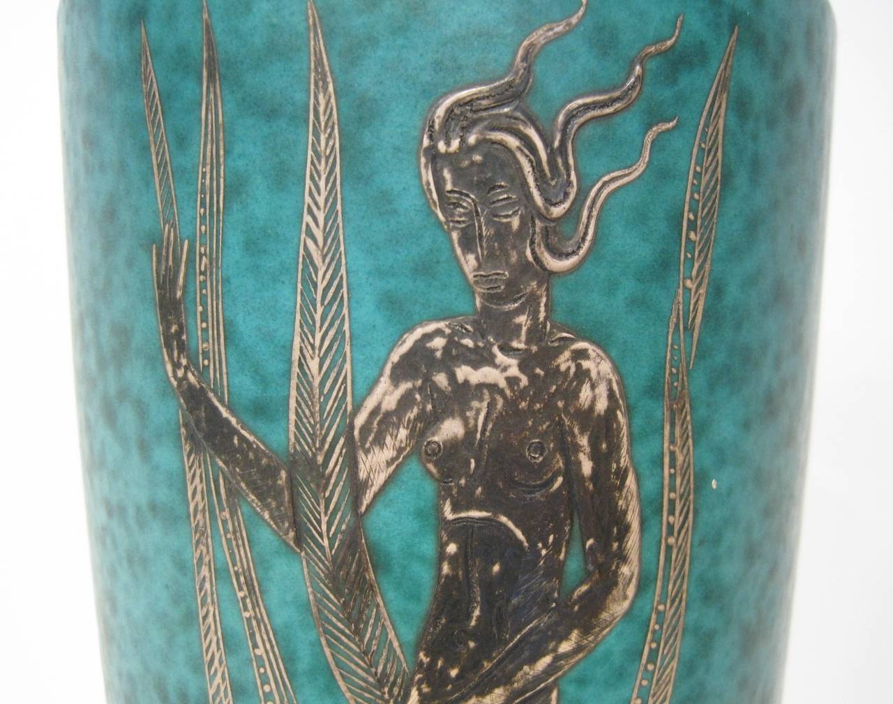 Vaso in gres con intarsi in argento, anni '30 circa, Svezia.

Spedizione gratuita negli Stati Uniti e in Canada.