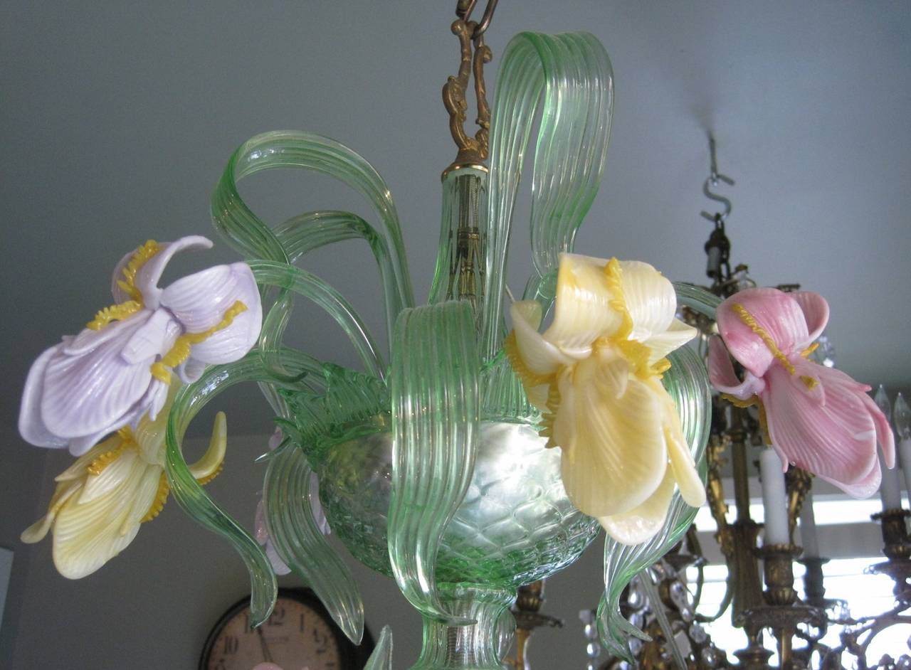This chandelier boasts 62 individual stems and flowers made from handblown glass. It has a total of eight lights.

Free shipping within the United States and Canada.