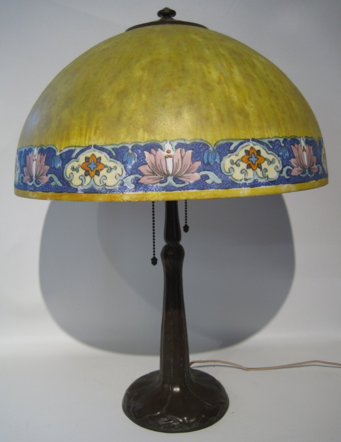 Handel lamp with obverse painted and etched shade.

Free shipping within the United States and Canada.