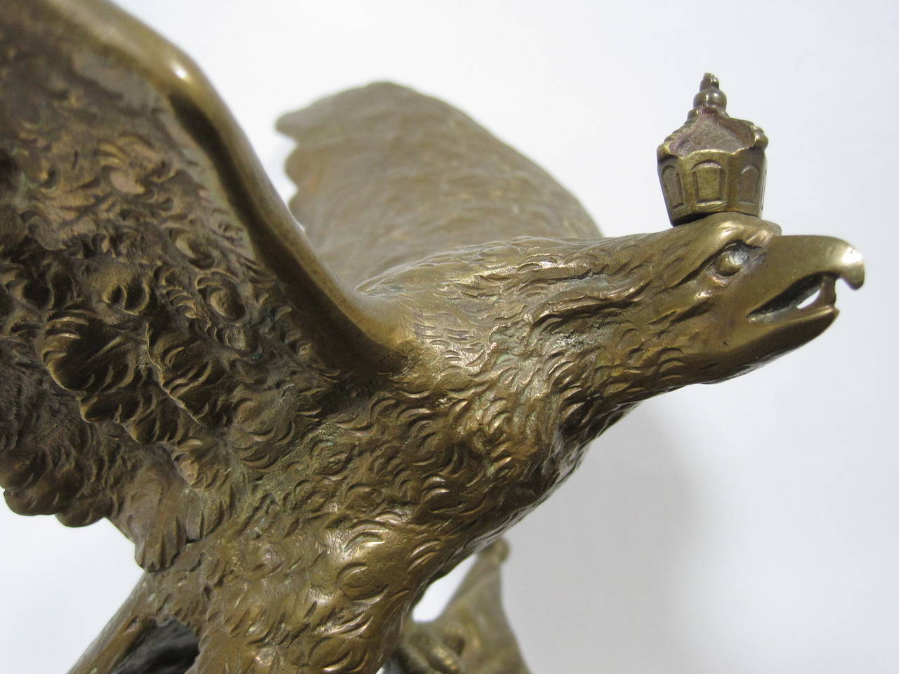 Early 1900's Bronze eagle on cannon with Flag, insignias and crown on top of eagle.  This is an early German Naval piece that most likely belonged to a high ranking Naval official

Free shipping within the United States and Canada.