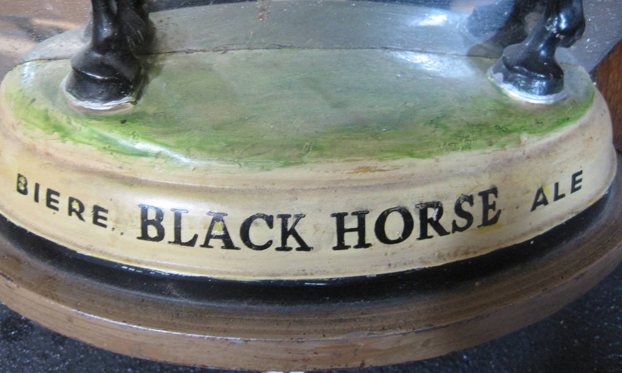 black horse ale statue