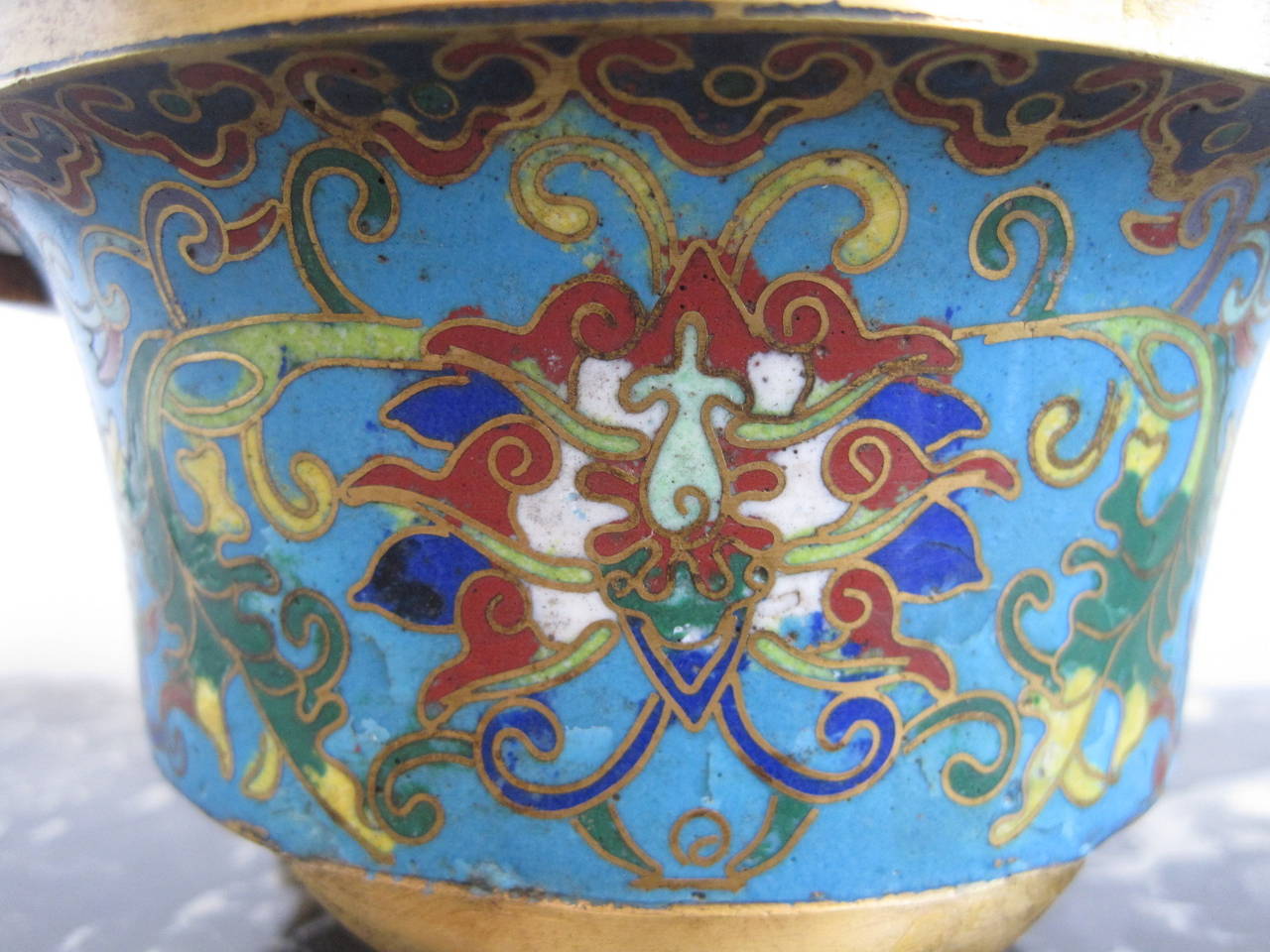 Chinese Gilt Bronze Cloisonne Tripod Censer with Xuande Mark

19th Century Incense burner decorated in coloured enamels with numerous flower sprays.

Free shipping within the United States and Canada.