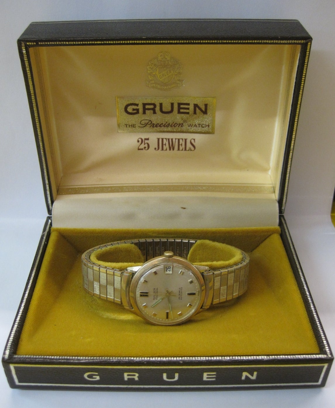 14k Gold Gruen Precision Watch
25 jewel working watch with original box.

Free shipping within the United States and Canada.