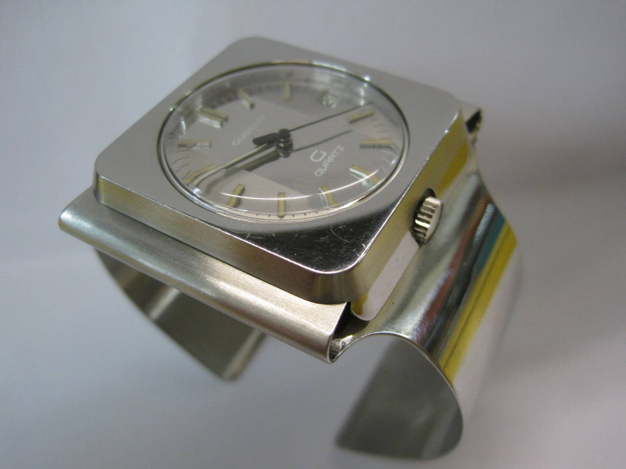 Gubelin Eames Era cuff watch.

Free shipping within the United States and Canada.