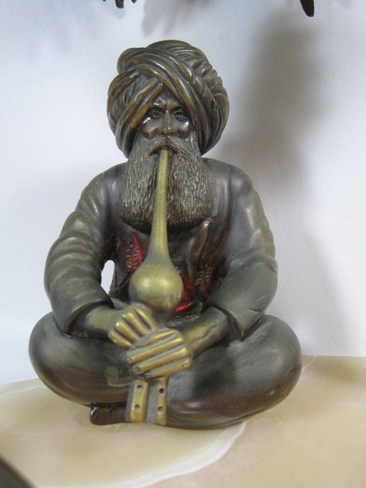 Arab snake charmer bronze sculpture.
Made from bronze, metal with marble base.

 