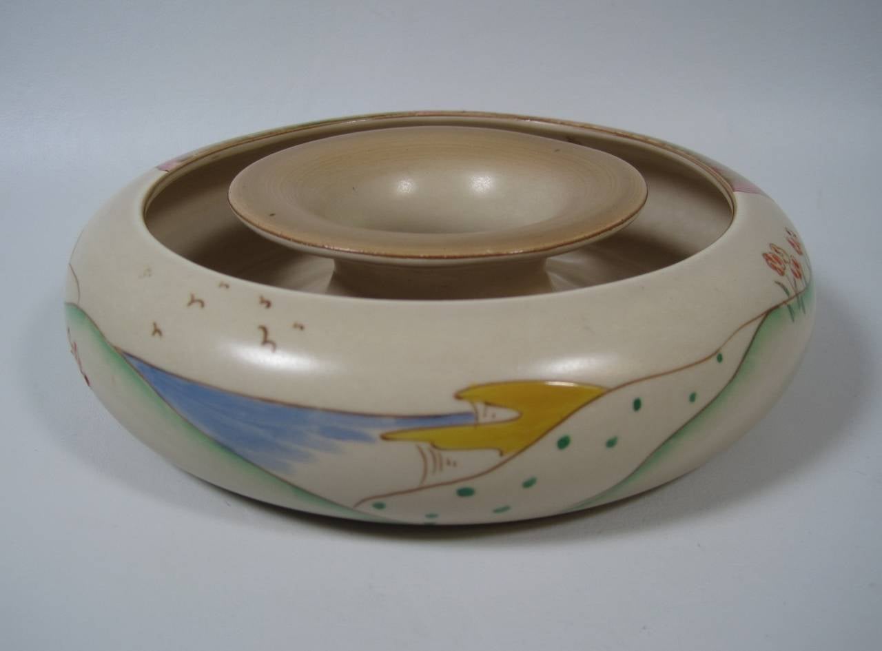 Clarice Cliff posy ring vase.

Free shipping within the United States and Canada.