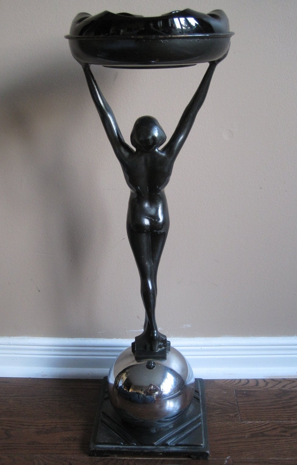 Frankart Nude Art Deco Smoke/Ashtray Stand

Figural Nude Smoking stand with cast iron base, chrome ball and original glass ashtray.

Free shipping within the United States and Canada.