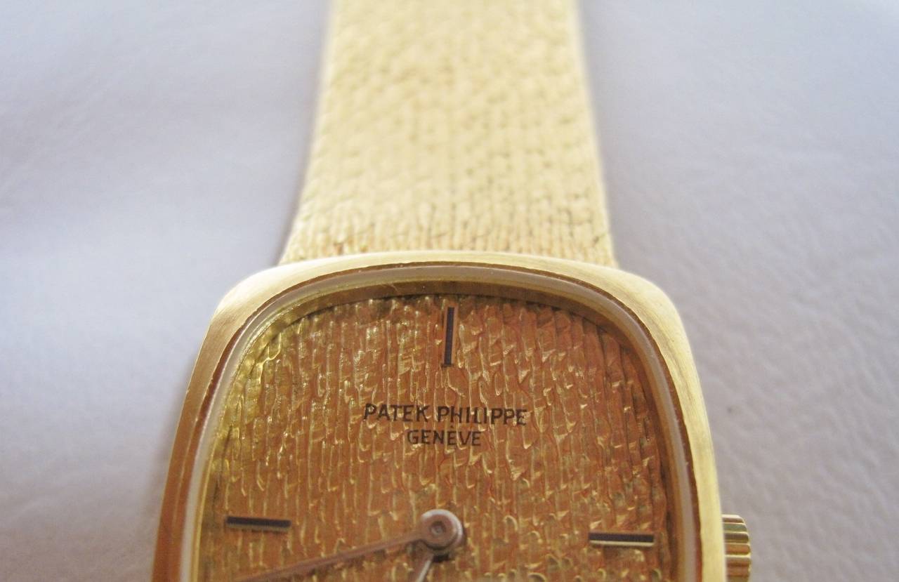 Women's Patek Philippe 18-karat gold watch.
Stunning watch with 18-karat gold case and band and comes with original paperwork.
Weight: 55.6 grams.

Shipping within the United States and Canada is free.