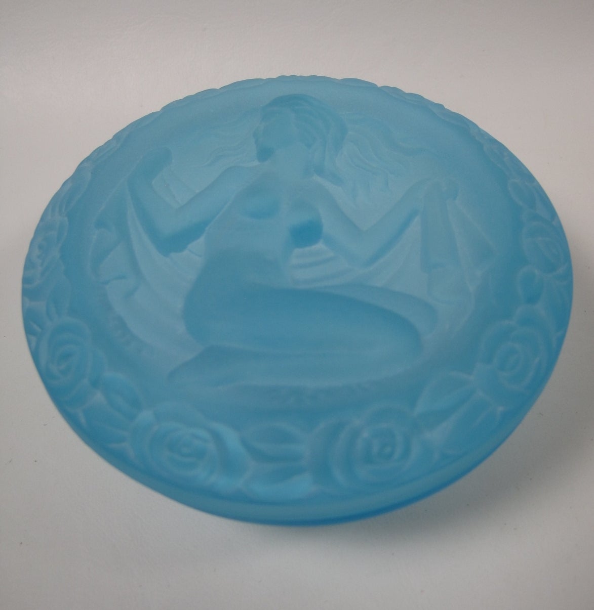 Nude Art Deco Czech Art Glass Powder or Jewelry Box
Precious Bohemian box made from aqua blue pressed glass.

Free shipping within the United States and Canada.