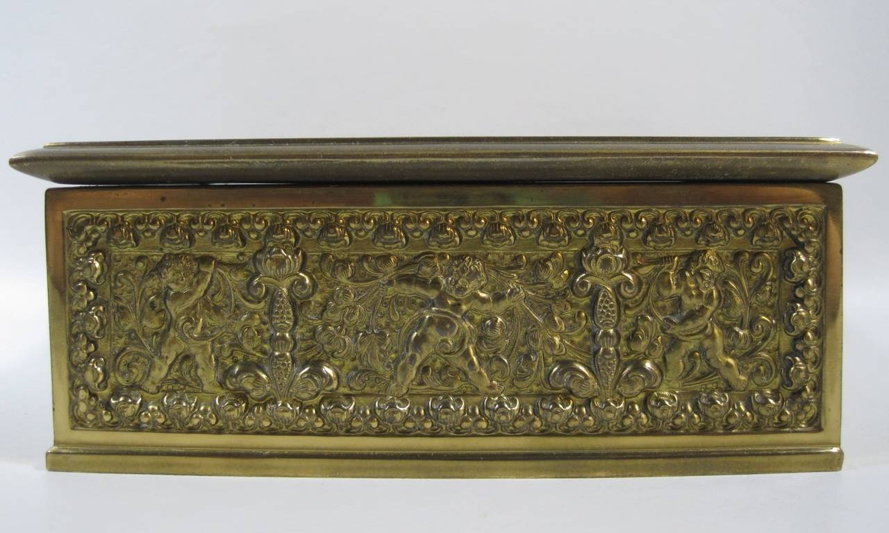 Erhard & Sons (Sohne) Art Nouveau brass repousse tobacco or jewelry box.

Free shipping within the United States and Canada.