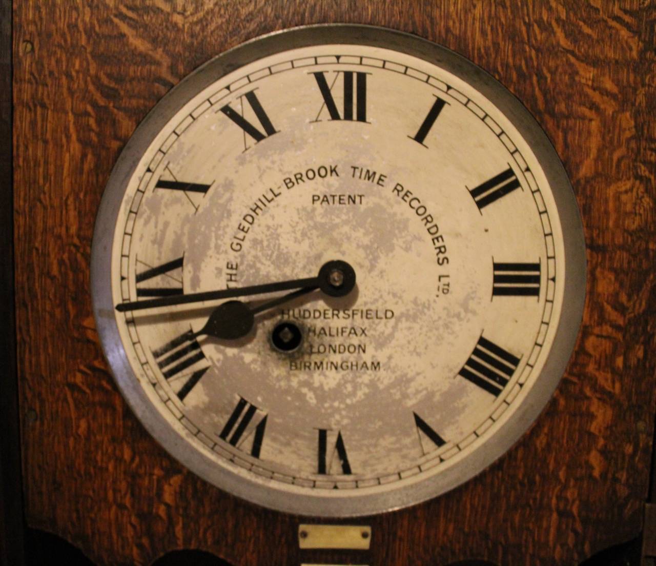 English time recorder clock, Machine Age.

Solid oak English time recorder clock by Gledhill Brook Time Recorders Ltd. This clock has a robust fusee movement and is coined as the 