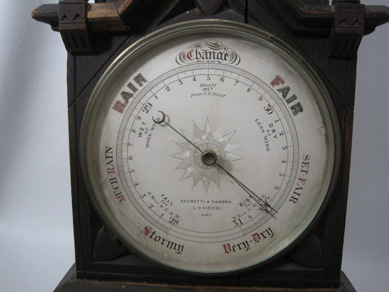 19th century Negretti & Zambra aneroid barometer.

Large English oak, Gothic style barometer.

Free shipping within the United States and Canada.