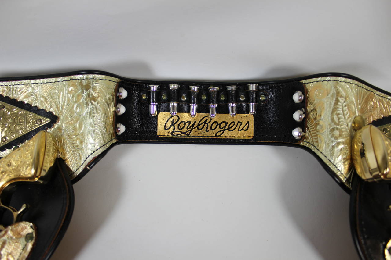 vintage roy rogers cap guns and holster
