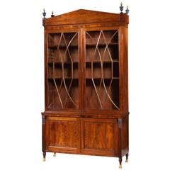 Federal Carved Mahogany Bookcase with Brass Paw Feet, circa 1805-1810