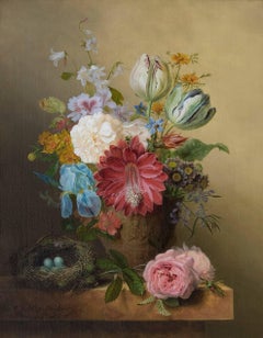 A still life with flowers and a bird's nest