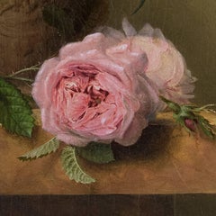 A still life with flowers and a bird's nest