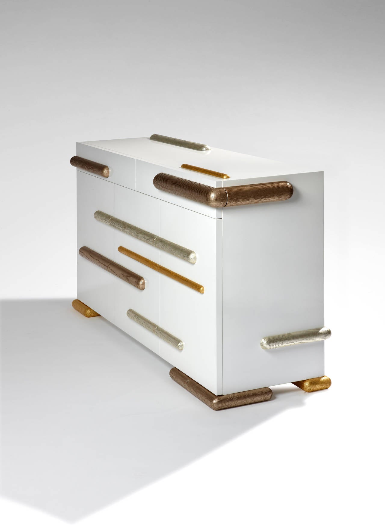 Sideboard.
Cat-Berro Edition 2011
Two small drawers.
Two doors. One central drawer.
Pearly enameled wood. Sanded oak. Gold leaves.
Dimensions: L 60’’, H 35.5’’, D 18’’.
L 150 cm, H 90 cm, P 45 cm.

Signed piece of a limited edition of 8 + 2 AP +
