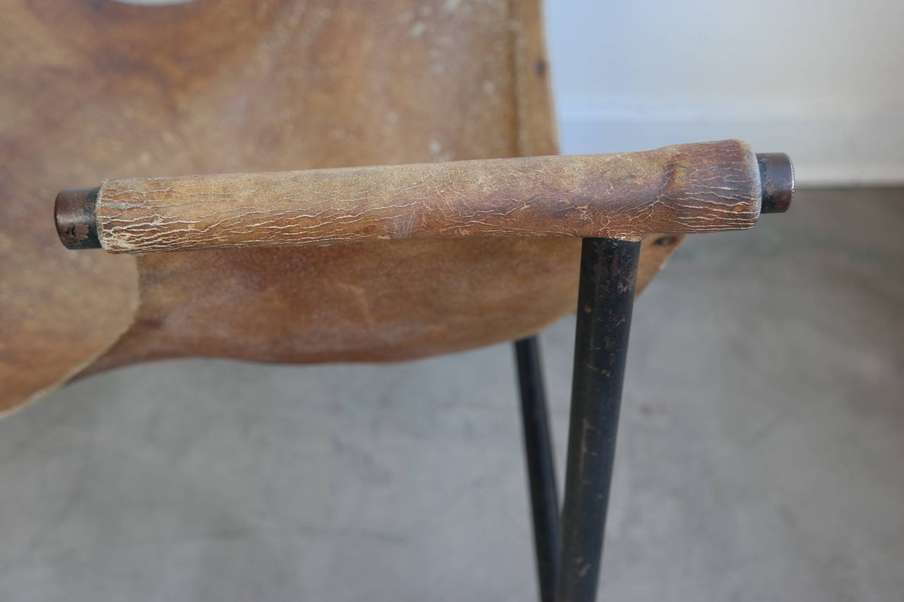 Mexican Worn Leather and Iron Sling Chair For Sale