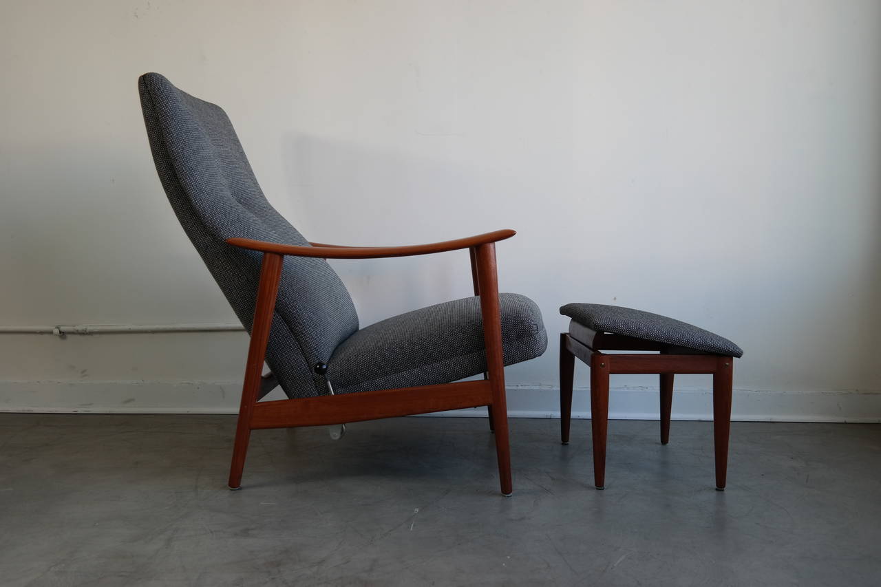 Great example of mid century Norwegian design, This Chair features a reclining mechanism witch also doubles as a rocker. Very comfortable, the ottoman has an inclined position to better fit the contour of the chair. In excellent restored condition