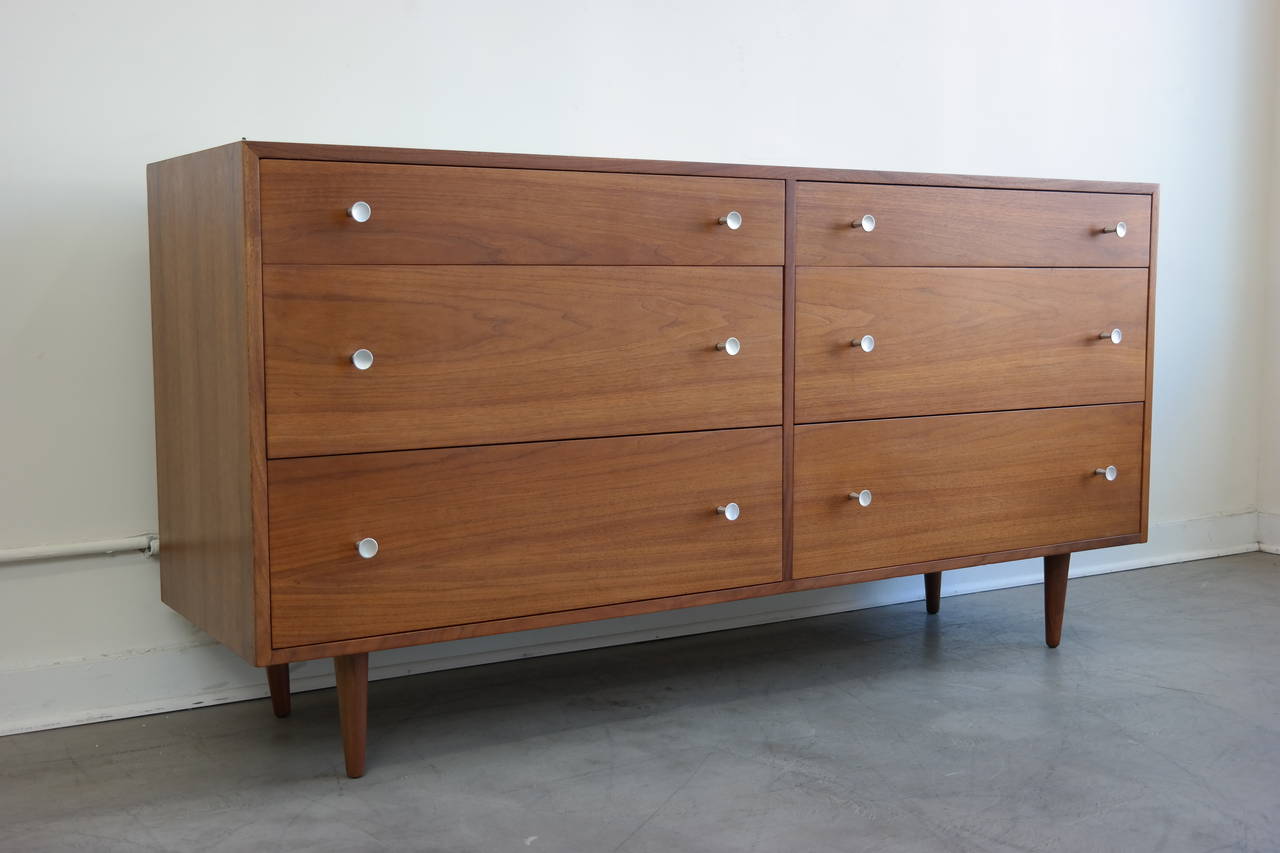 Exceptional Mid-Century Modern dresser designed by Milo Baughman for Glenn of California. Rich walnut original finish in excellent condition, six large drawers with elongated tulip pulls. Original finish and wear on hardware. In overall excellent