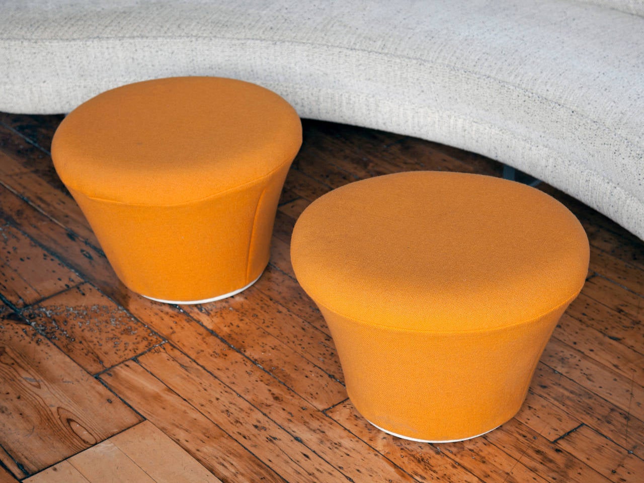 Pair of mushroom footstools in original, orange wool fabric designed by Pierre Paulin in 1963. Labelled on base: Artifort, 1975. The 