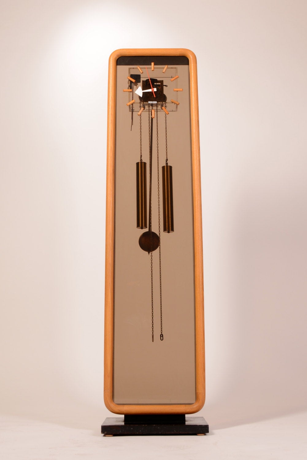 This is a George Nelson floor clock for Howard Miller Clock Company, model number 622. Solid oak case concealing lucite front and cover for all brass works, weights and pendulum. Chimes at quarter hour and hour. 

 Local pick up is available at